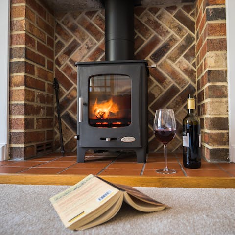 Cosy up by the wood-burning stove