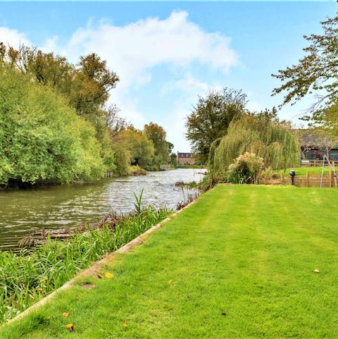 Stretch your legs in the lush green garden, and listen to the water trickle past