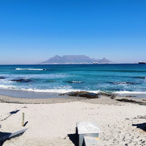 Stroll to Blouberg’s Dolphin Beach and take in the views of Table Mountain