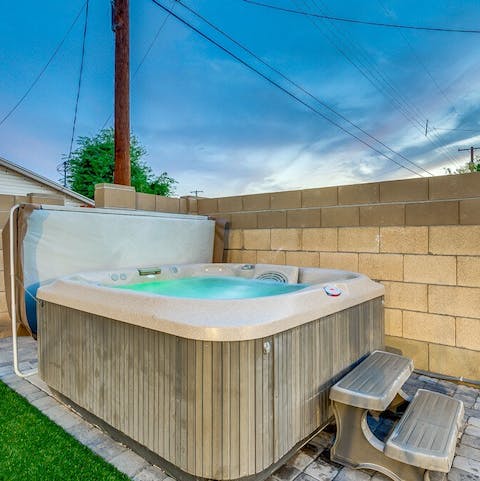Hop in the jacuzzi for a relaxing soak