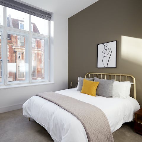 Wake up to views of the old red brick buildings of Westminster from the comfort of your plush streets