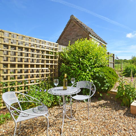 Enjoy a tipple in the charming back garden