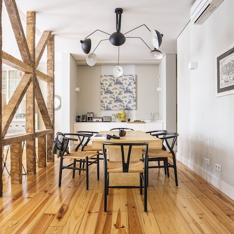 Gather for a home-cooked meal around the stylish dining table