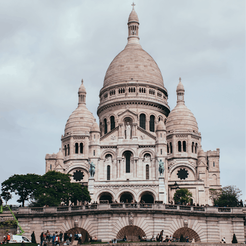 Stroll a few minutes to the Basilica of Sacré-Coeur