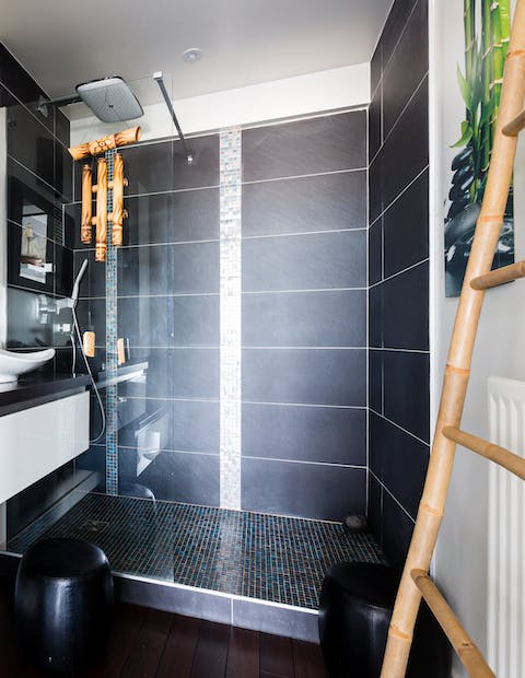 The slate and bamboo shower room