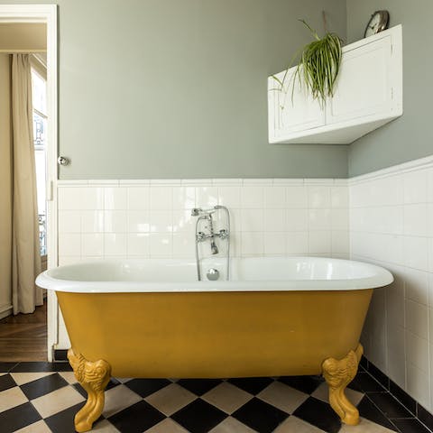 Treat yourself to a long, hot soak in the sumptuous clawfoot bathtub