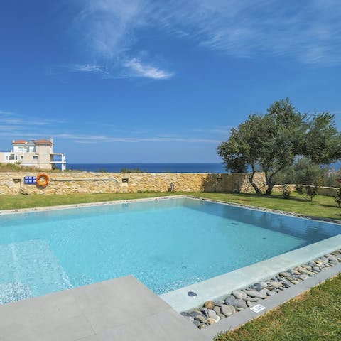 Cool off from the Greek heat in your private pool, taking in the sea views