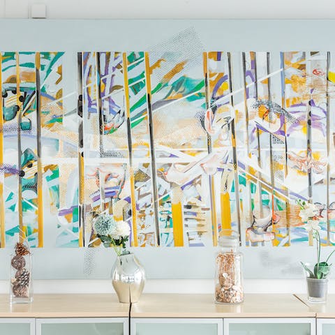 Study the unique and colourful modern art on display in the home