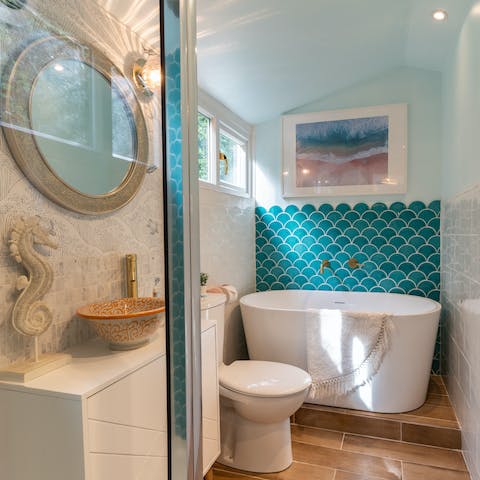 Sink into your deep, freestanding tub after a busy day exploring the Cornish coast