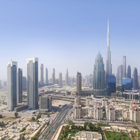 Admire breathtaking views of Dubai's skyline from the bedroom and lounge