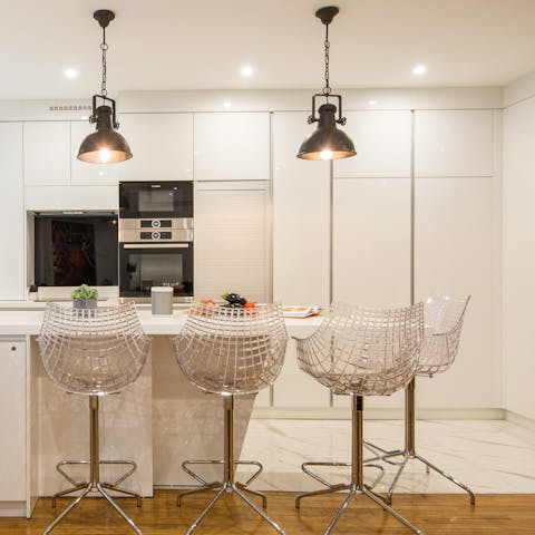 Sleek and stylish white kitchen