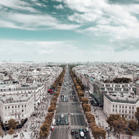 Take a walk down to the iconic Champs Elysées