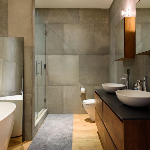 Polished concrete walls in the master bath