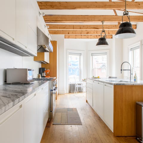 The exposed wooden beams in the kitchen