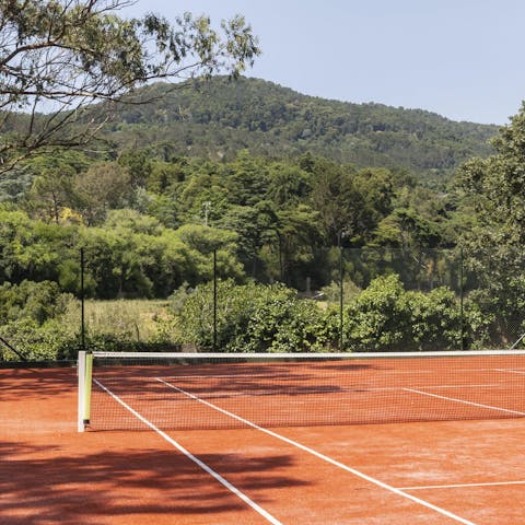 Embrace friendly competition on the private tennis court