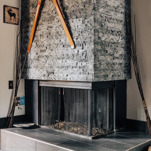The modern granite and glass fireplace