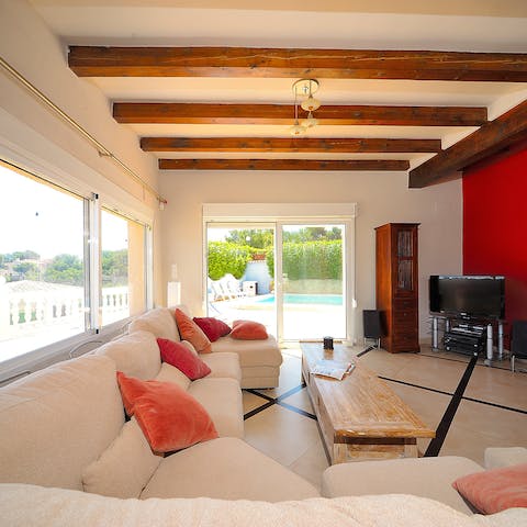 Open up the French doors to let the sea breeze in while you siesta on the sofas