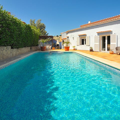 Cool off in the glistening swimming pool