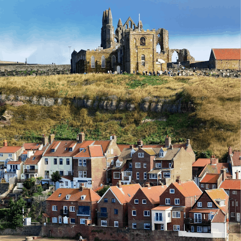 Visit the historical monastery of Whitby Abbey, standing on the East Cliff above Whitby