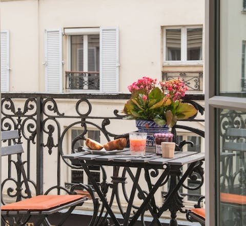 Have a glass of champagne or enjoy the breakfast provided by your host on the balcony