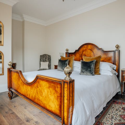 Slumber in style in the fabulous antique, wooden bed