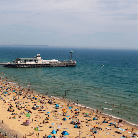 Soak up the sun on Bournemouth Beach, just under a half-hour walk from home