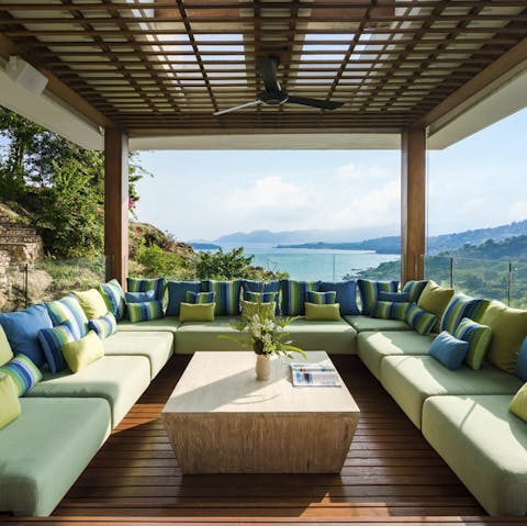 Watch the sunrise and set from the privileged position of this hillside home