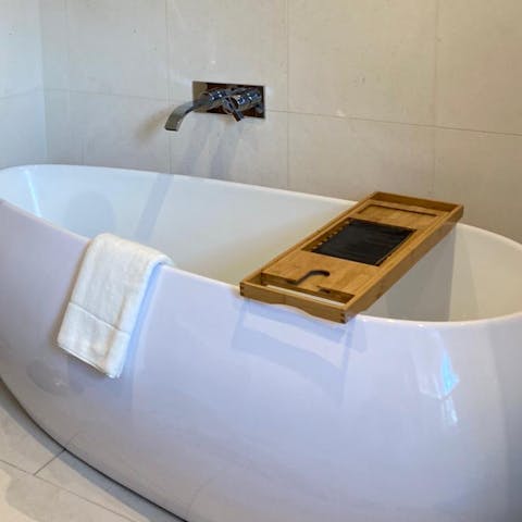 Sink into the bathtub and unwind after sightseeing