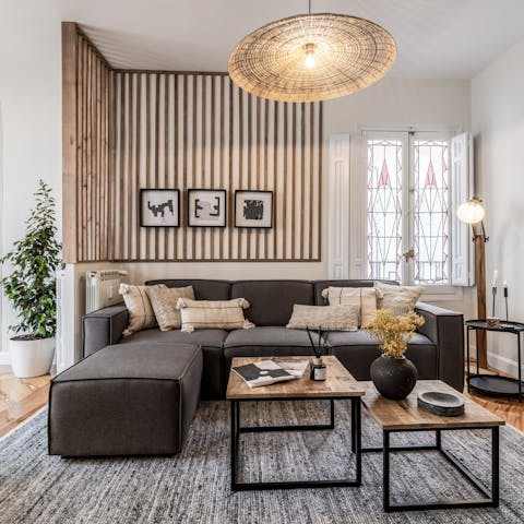 Relax in the stylish living area after exploring the Almagro district