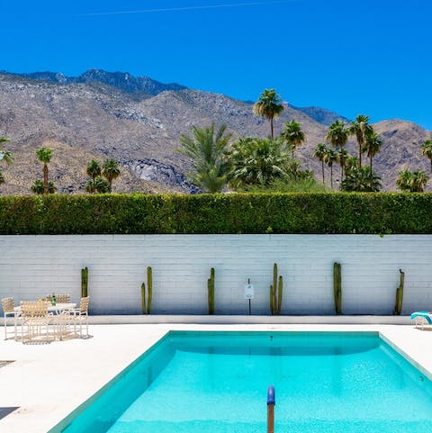 Gaze at surreal views of the Palm Springs mountains while you splash around in the pool