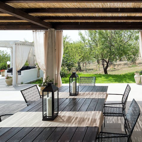 Gather outside for some Sicilian feasts and wine on the patio