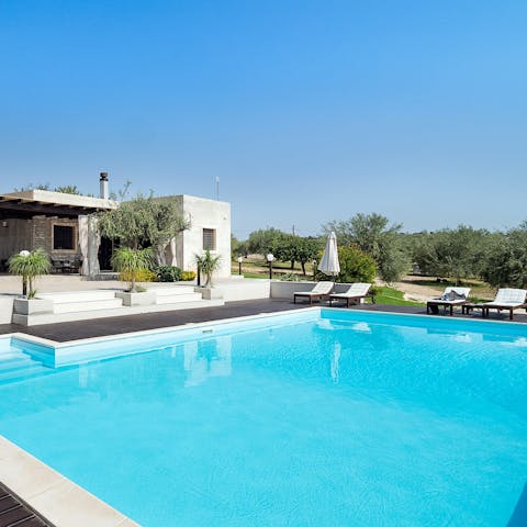 Lounge in the sun and enjoy dips in the private swimming pool
