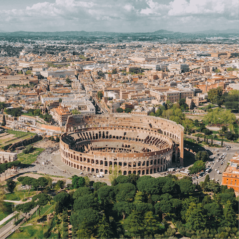 Visit the iconic Colosseum, just a twenty-one minute bus ride away