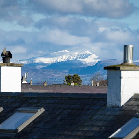 Glimpse the white peaks of Mount Snowdon