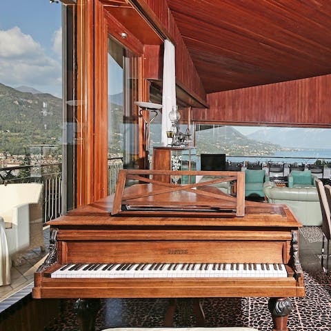 Admire the vistas through the window while you tinkle the keys on the piano