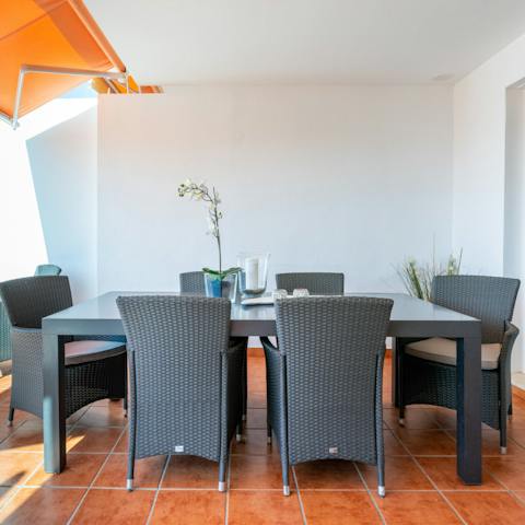 Dine alfresco on the terrace and enjoy privacy under the clear blue skies