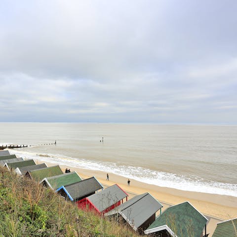 Step down to the beach, a true stone's throw from the home