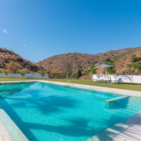 Cool off with a dip in the vast outdoor pool