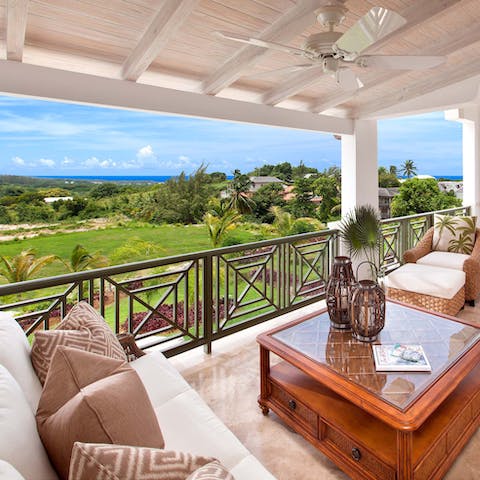 Watch the Bajan sunset from the shady privacy of the covered balcony
