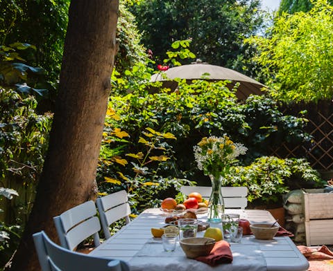Sit down for brunch in your luscious garden with plenty of seating