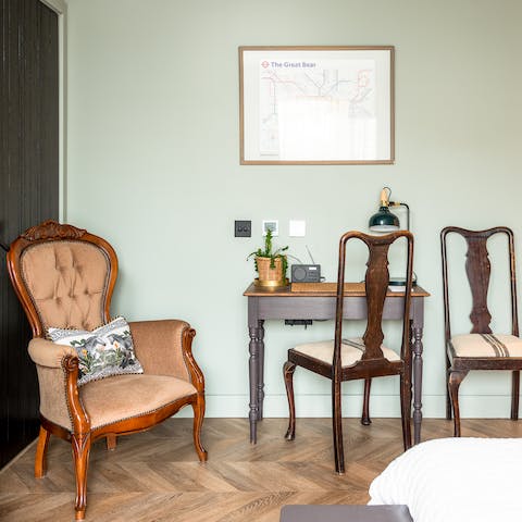 Recline with a coffee in the vintage chair or plan your itinerary at the writing desk