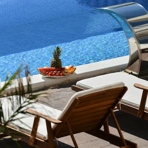 Relax by the private pool