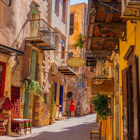 Spend more time than you intended wandering the winding backstreets of Chania, half an hour away