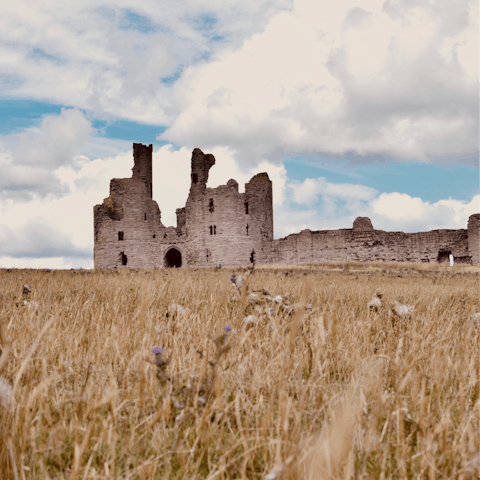 Hike the coast path for views of Dunstanburgh Castle