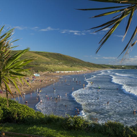 Learn to surf the beginner-friendly waves at Woolacombe Beach
