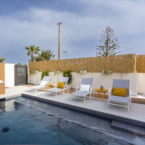 Cool off with a refreshing dip in your private outdoor pool, or recline on a lounger