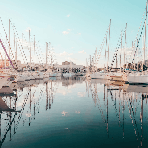 Walk six minutes to the port, where you can admire the boats or catch a ferry