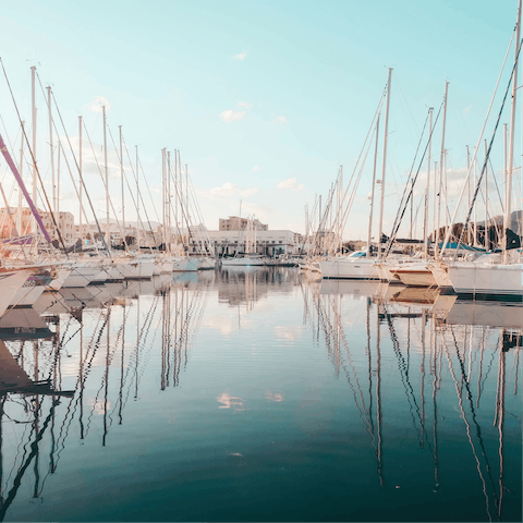 Walk six minutes to the port, where you can admire the boats or catch a ferry  