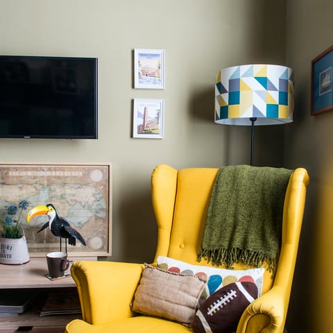 Get comfortable on the yellow armchair