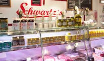 Taste the gourmet food at Schwartz's Deli